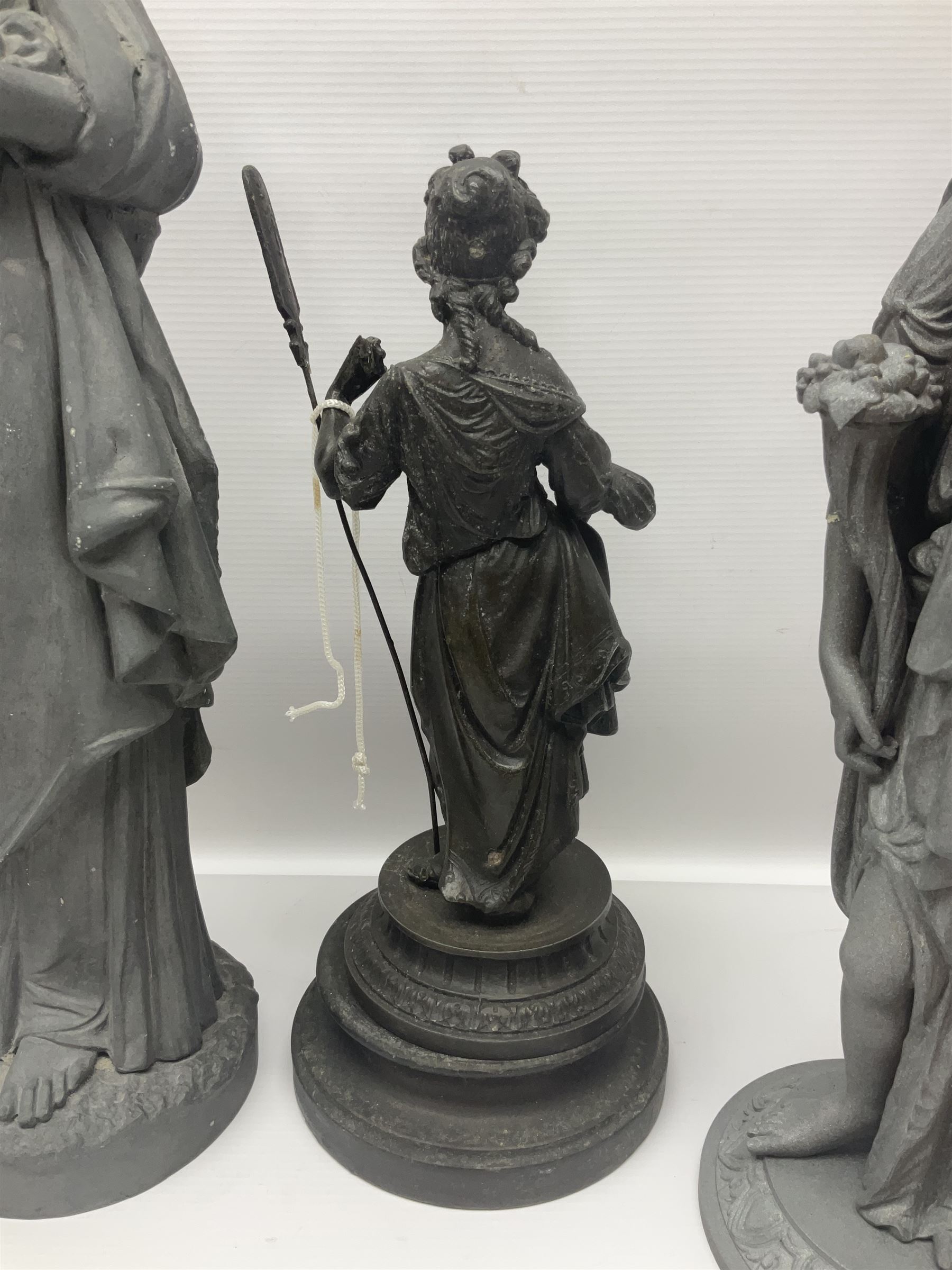 Four spelter figures of women in neoclassical dress, largest H47cm