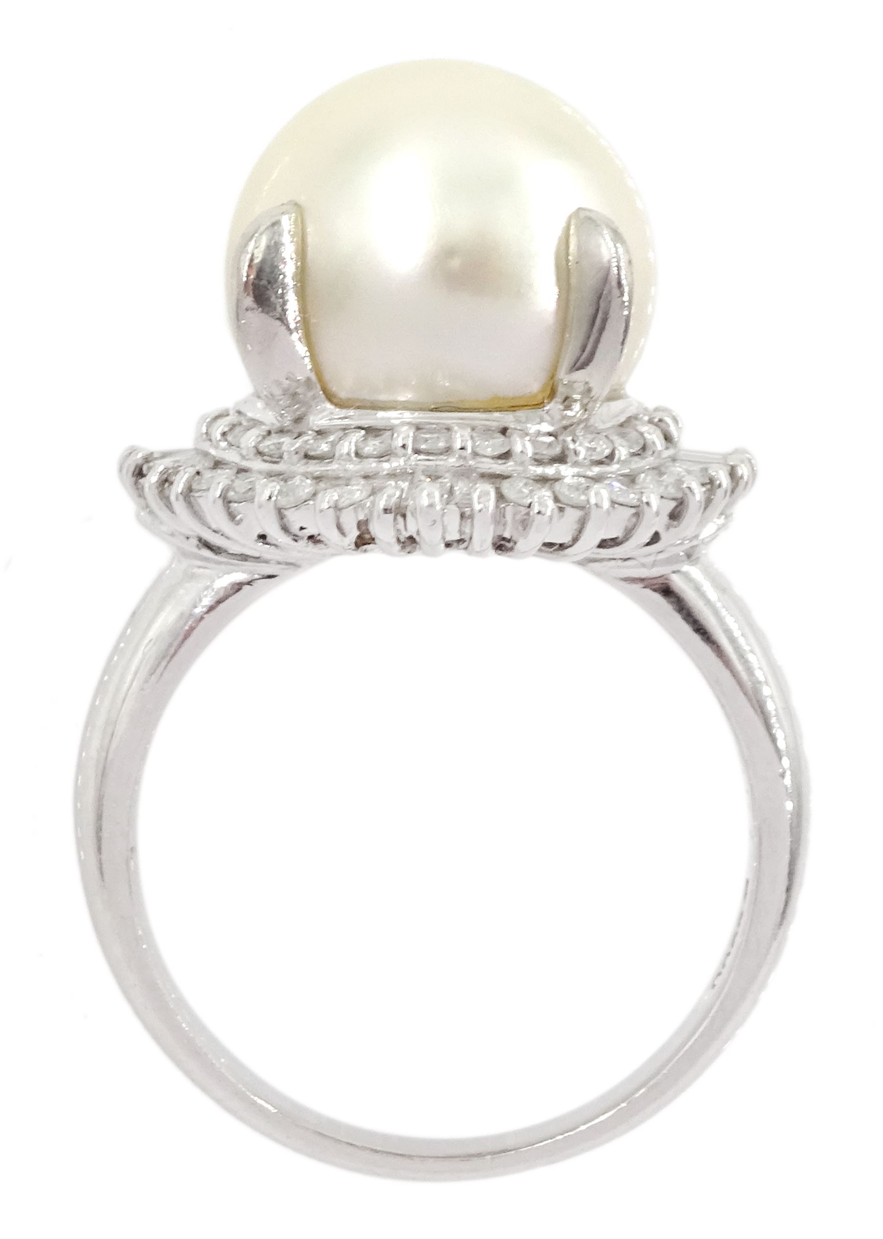 Platinum single stone cultured pearl and diamond cluster ring, stamped, total diamond weight approx 0.50 carat