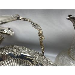 Silver plated three branch epergne, together with a silver plated cut glass claret jug, and silver plated embossed swing handled basket, epergne H30.5cm