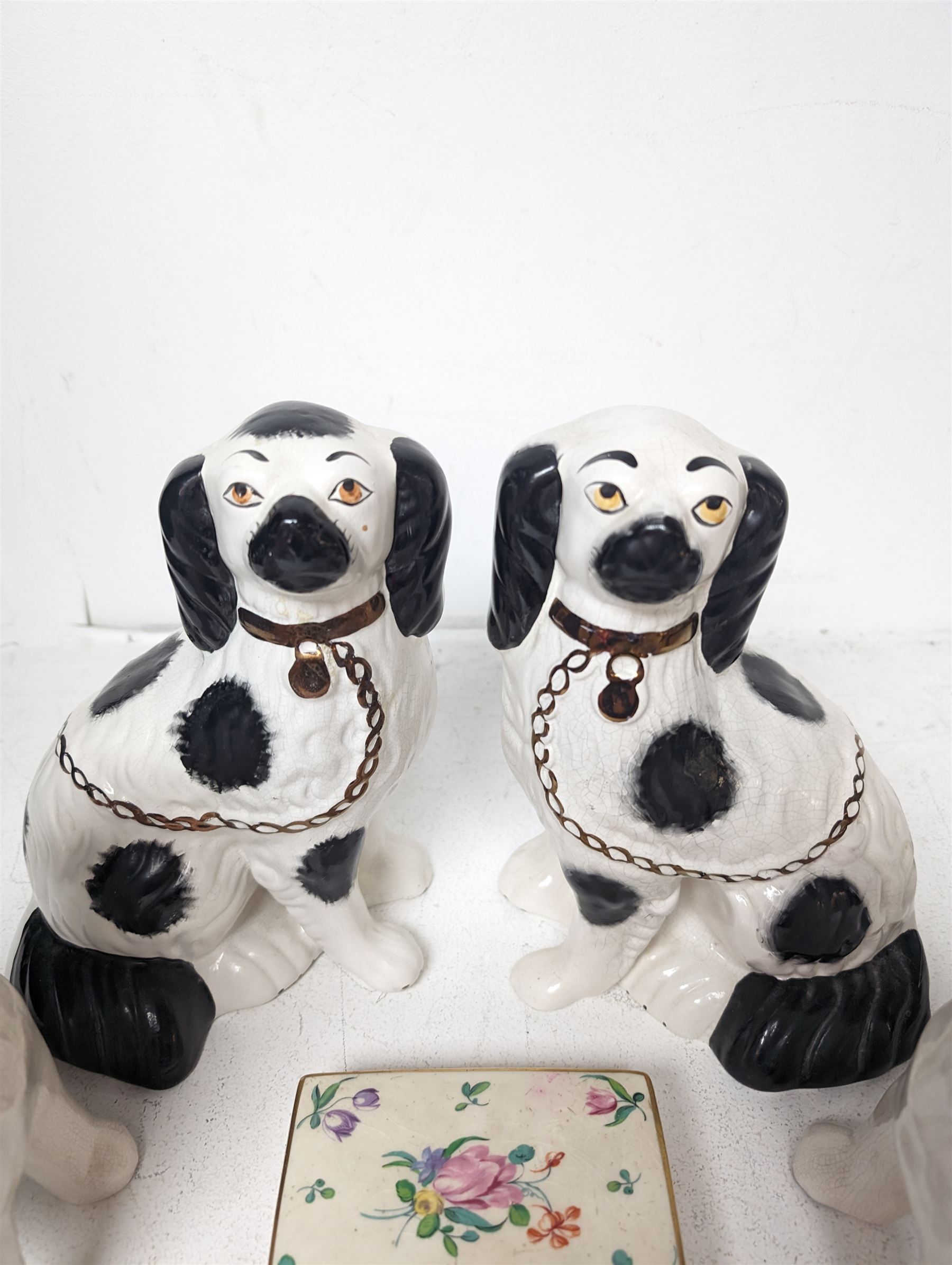 Pair of Staffordshire style dogs, together with a pair of Staffordshire style cats and a Clarice Cliff for Royal Staffordshire floral trinket box