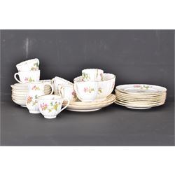 Coalport part tea service, decorated with floral sprigs, including eight cups and saucers, milk jug, eight dessert plates etc  