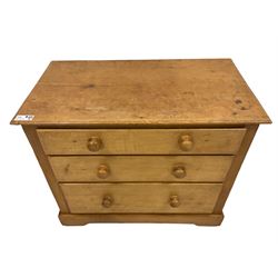 Victorian pine and satinwood chest, fitted with three graduating drawers, on skirted base with castors