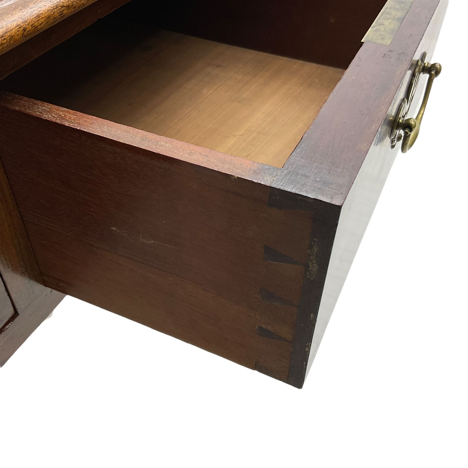 Late 19th century mahogany side table, moulded rectangular top over three drawers, pierced brass handle plates with swan neck handles, on acanthus carved cabriole supports with paw carved feet