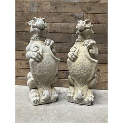 Pair cast stone garden Griffins, seated with shields