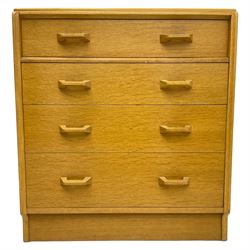 E. Gomme for G-Plan - 'Brandon' light oak chest, fitted with four long drawers, on skirted base