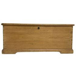 Victorian pine blanket box enclosed by hinged lid, fitted with wrought metal carrying handles, on skirted base
