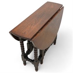 Small 17th century design oak drop-leaf, table oval top over bobbin-turned gate-leg supports, united by stretchers