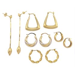 Four pairs of gold hoop earrings and a pair of gold pendant stud earrings, all 9ct