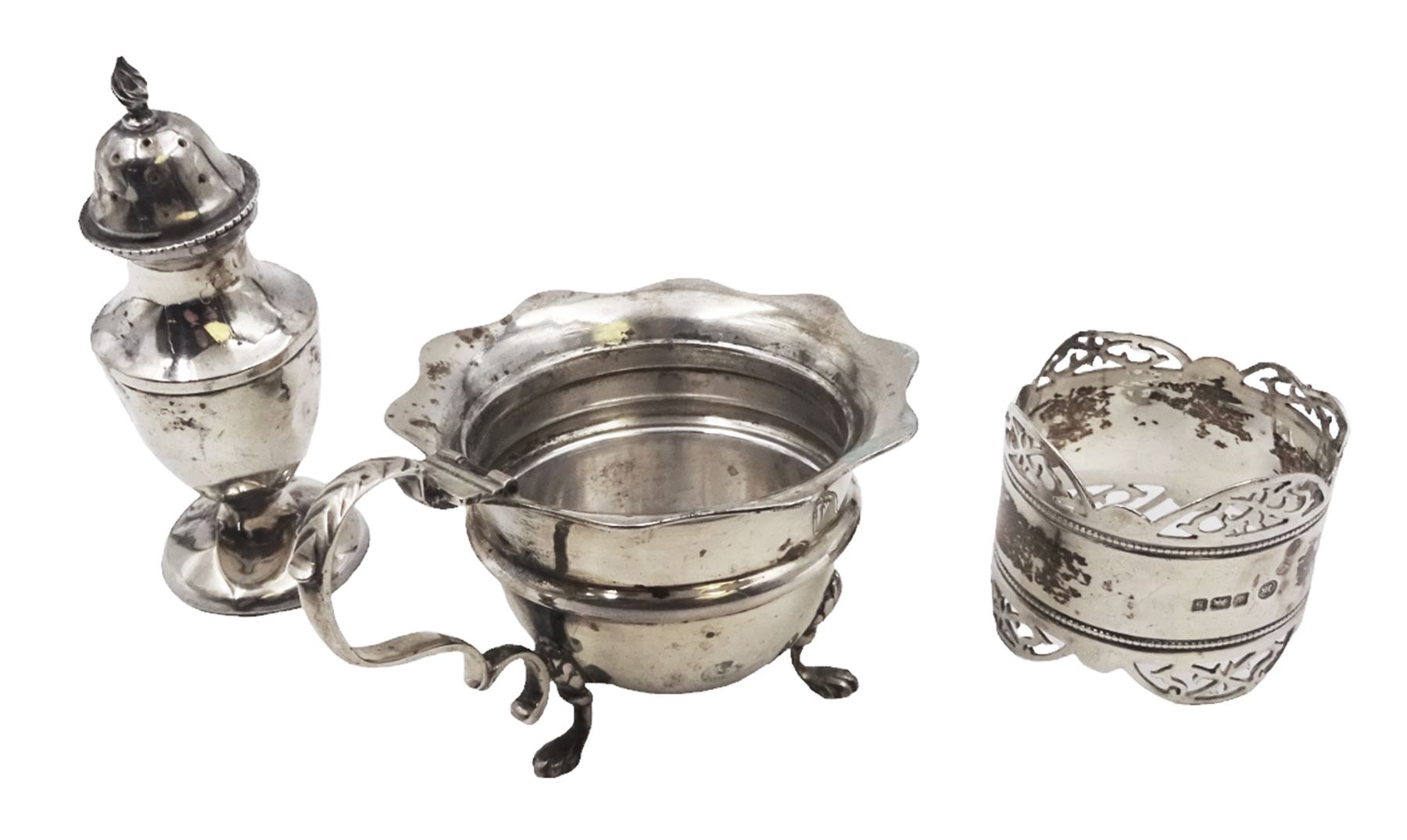 Group of silver, including mustard pot, pepper shaker and napkin ring, all hallmarked 