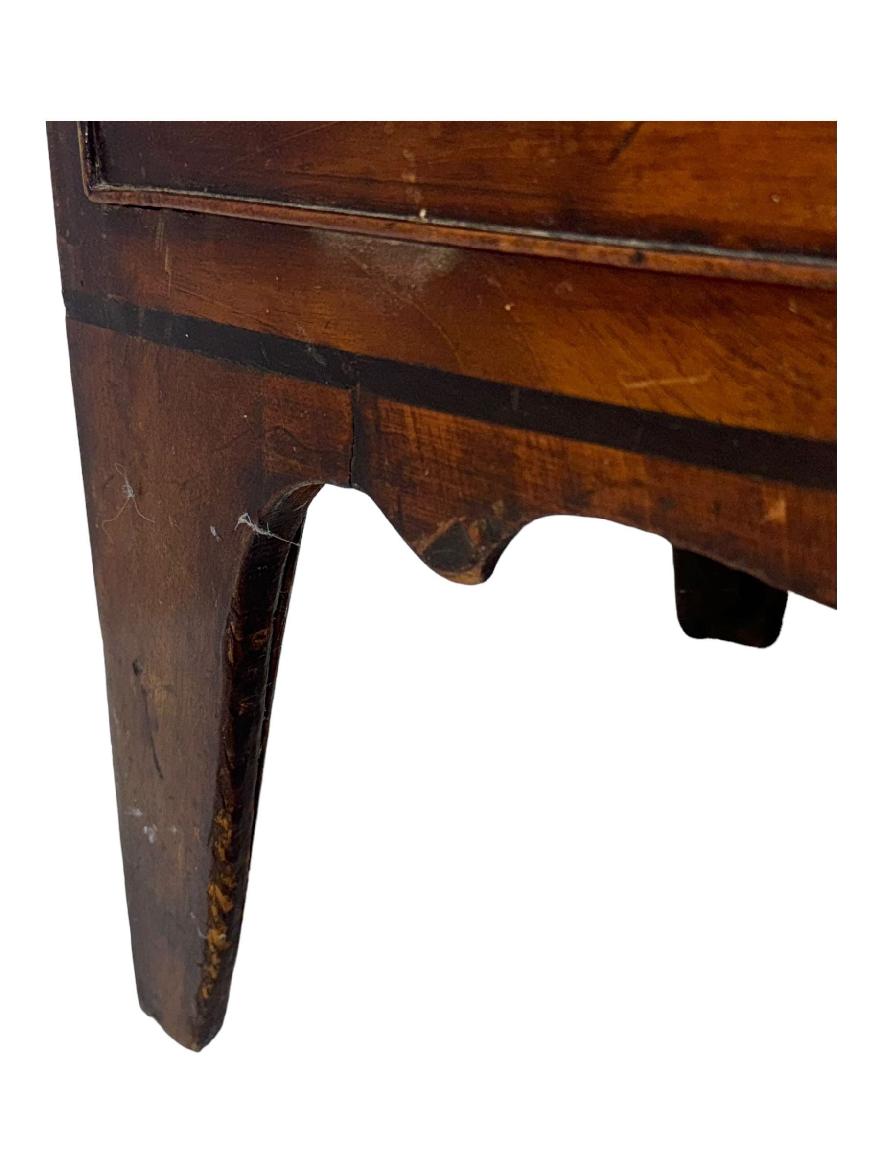 Early 19th century mahogany bow-front chest, fitted with two short over three long graduated cockbeaded drawers, each with turned wooden knobs and bone escutcheon, raised on splayed bracket supports