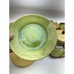 French green and yellow glazed tea and dinner wares by Etienne Noel, including milk jugs, teacups, side plates, bowls etc (43)