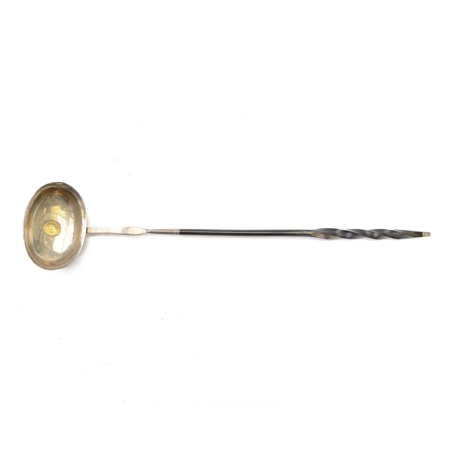 George III silver toddy ladle, the oval bowl set with a King George III 1802 gold one third of a guinea coin, with baleen twist handle, L40cm