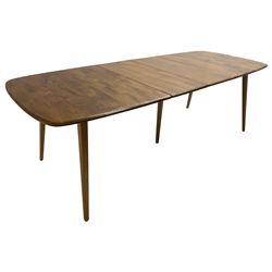 Ercol - light elm and beech 'Slide Leg Expanding Dining Table (444)', rectangular top with rounded corners, raised on tapered splayed supports, with two additional leaves