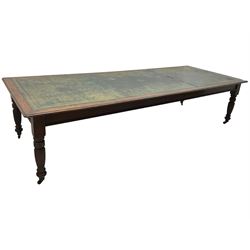 Large 10' 7'' late Victorian oak boardroom table, moulded rectangular top with inset green leather surface, on turned and reed moulded supports with brass and ceramic castors 