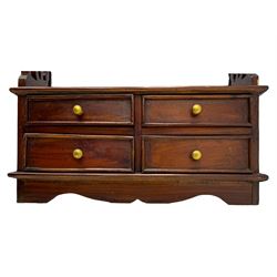 Georgian design mahogany open bookcase, fitted with three open shelves flanked by pierced uprights, with four drawers to the base with scalloped apron