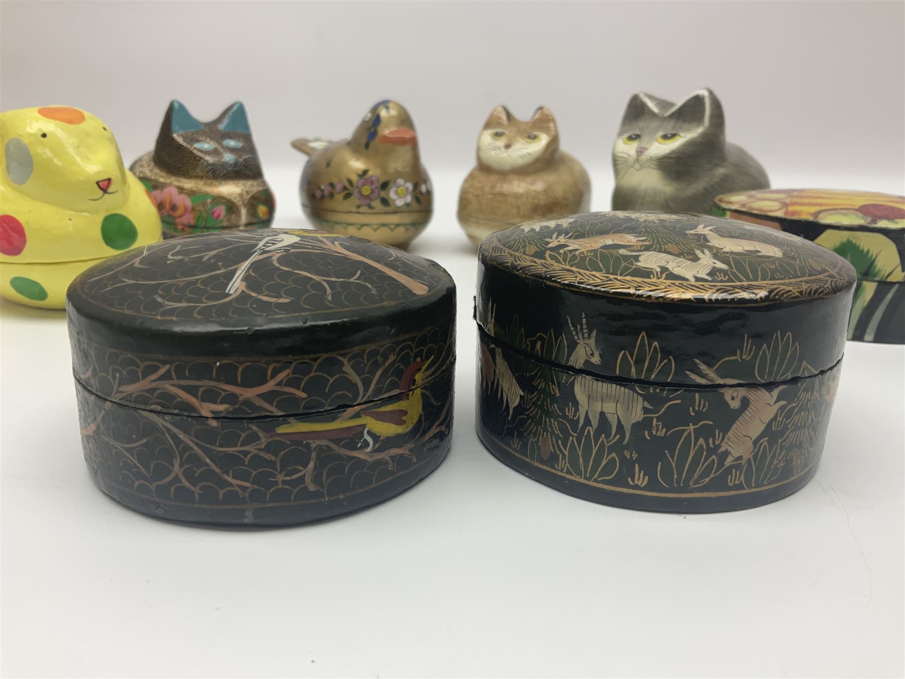 Eight lacquered boxes, including novelty painted boxes in the form of cats, rabbit and a bird, rabbit H7cm, L9cm