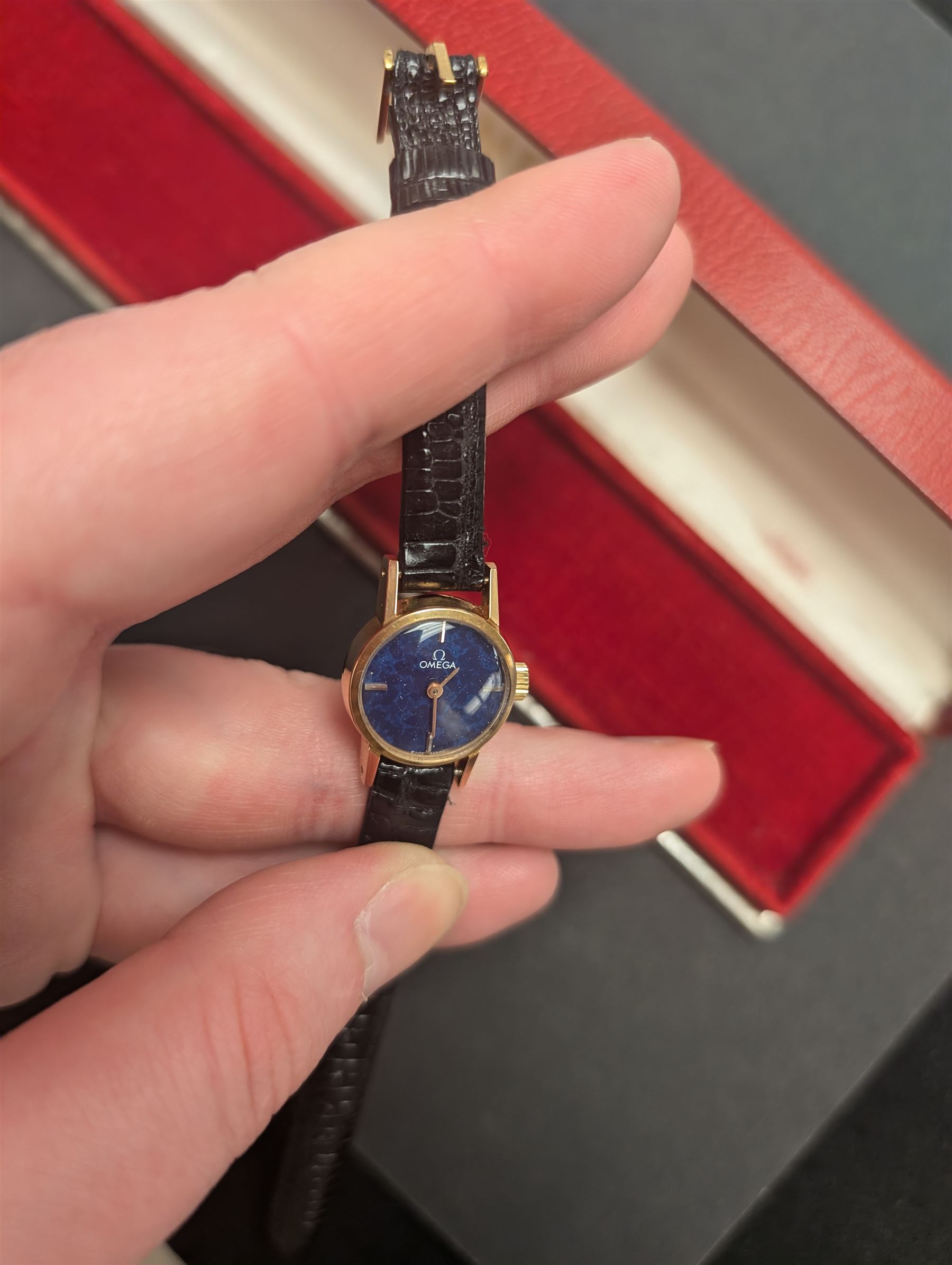 Omega ladies gold-plated and stainless steel manual wind wristwatch, lapis lazuli dial, on original leather strap with buckle, boxed