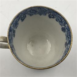 Rare 18th century Bow porcelain coffee cup, circa 1765-1770, profusely decorated with figures and dwellings in a rocky landscape, the interior with wide foliate border, H6cm