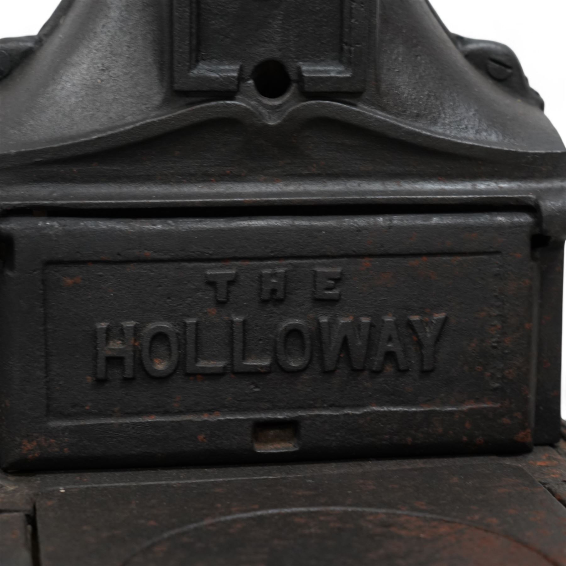 'The Holloway' cast iron portable range stove, fitted with surface burners and oven, on angular bracket feet 