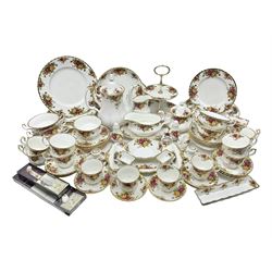 Royal Albert Old Country Roses pattern coffee service for six, comprising coffee pot, milk jug, cups and saucers, cake plate, together with miniature teapot, six teacups and saucers, six dinner plates, six side plates etc 