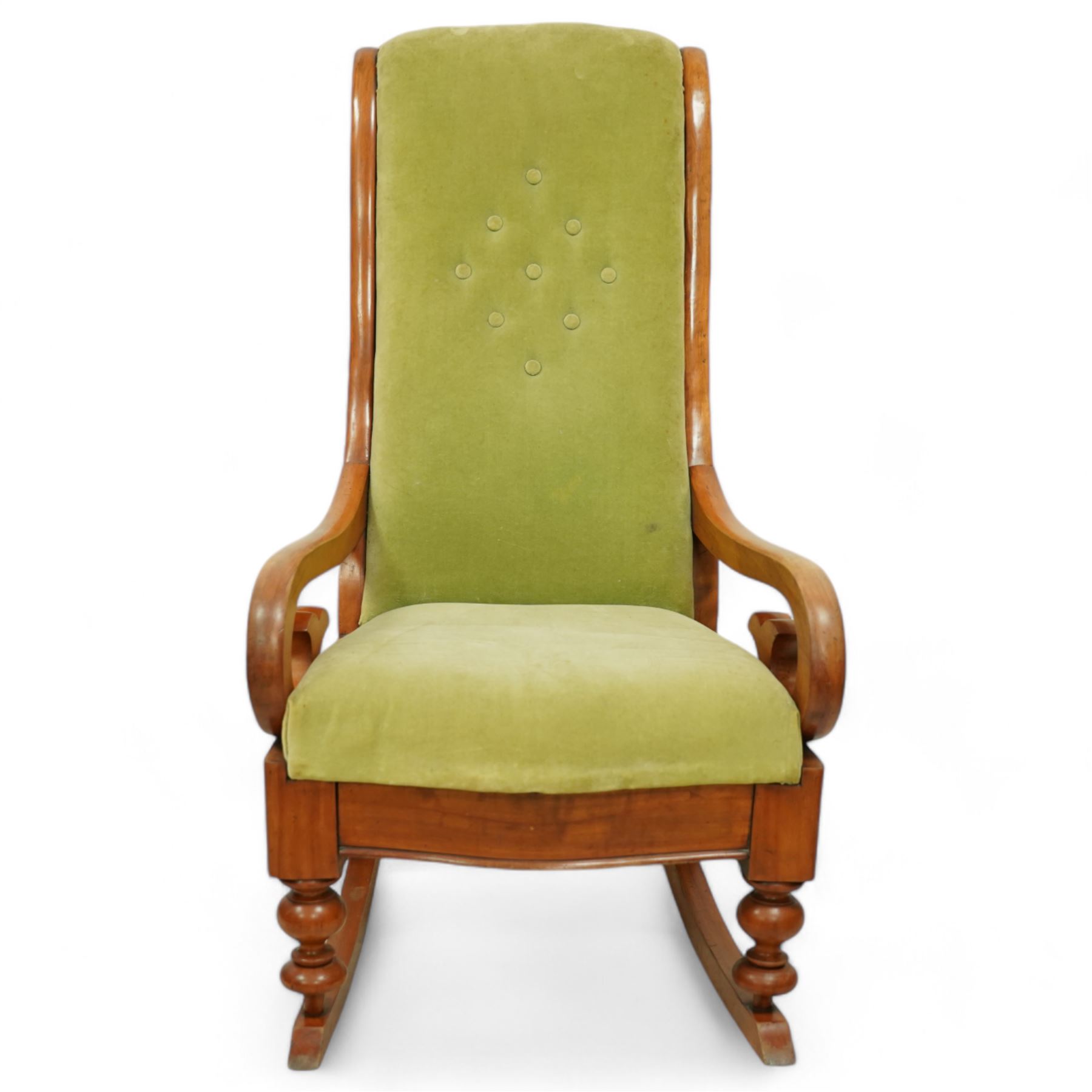 Victorian walnut framed rocking chair, upholstered in sage green buttoned fabric, scrolled arms, on turned front feet with rockers 