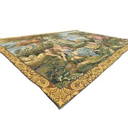 French machine woven tapestry, the scene depicting pastoral life with shepherds and sheep against a backdrop of lush foliage and classical architecture, bordered by a floral and scroll design