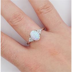 Silver opal and cubic zirconia cluster ring, stamped 925