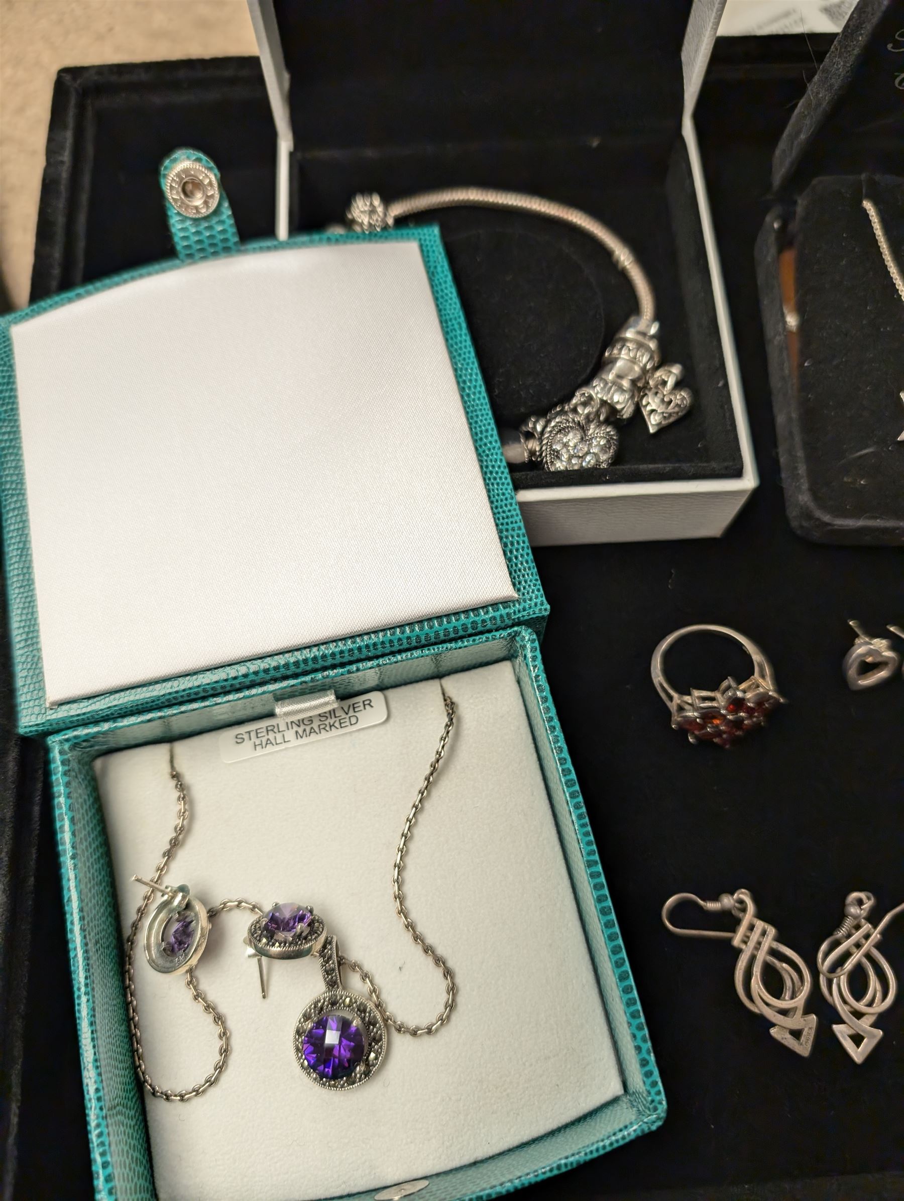 Silver jewellery, including garnet cluster ring, necklaces, etc, costume jewellery and some empty jewellery boxes 