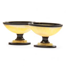 Pair of agate open salts, each of navette form, upon a stepped oval pedestal foot, H5cm