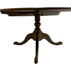 David Shackleton of Snainton - circular figured elm dining table, turned pedestal column on three splayed supports; together with a set of eight dining chairs, shaped cresting rail over shaped and pierced splat, upholstered drop in seat, on square supports united by stretchers 