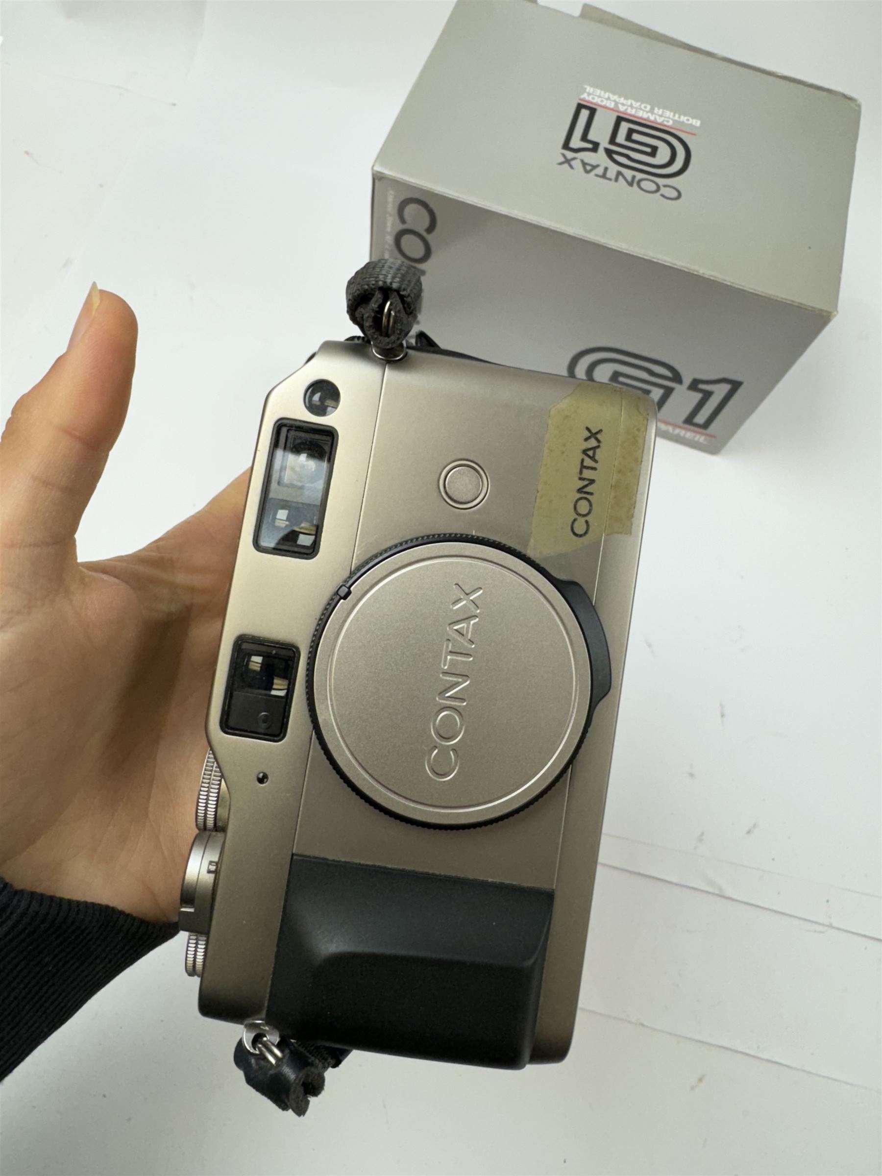 Contax G-1 rangefinder camera body, serial no. 077101, boxed with strap