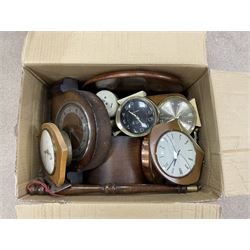 Assortment of alarm clocks and mantle clocks