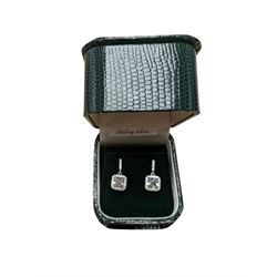 Pair of silver cubic zirconia pendant stud earrings, stamped 925, boxed