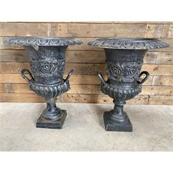 Pair of Victorian design ornate black painted cast iron garden urns, egg and dart rim, tapering column on pedestal base H63, D48