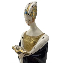 Early to mid 20th century porcelain figure modelled as a Medieval woman, dressed in a blue robe and reading a book, in the style of Dressel & Kister, stamped JV Paris beneath, H31cm 