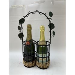 Moet & Chandon 1996 champagne, together with Babycham sparkling perry, in a wine holder, various contents and proof 