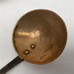 Large 19th century copper slotted spoon, with pierced flat bowl, L55cm, together with two 19th century iron handled ladles with circular copper bowls, largest example L48.5cm, (3)