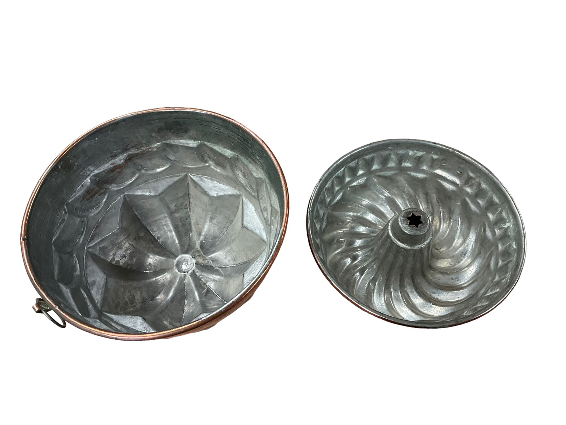 Two Victorian copper jelly moulds, largest D20cm