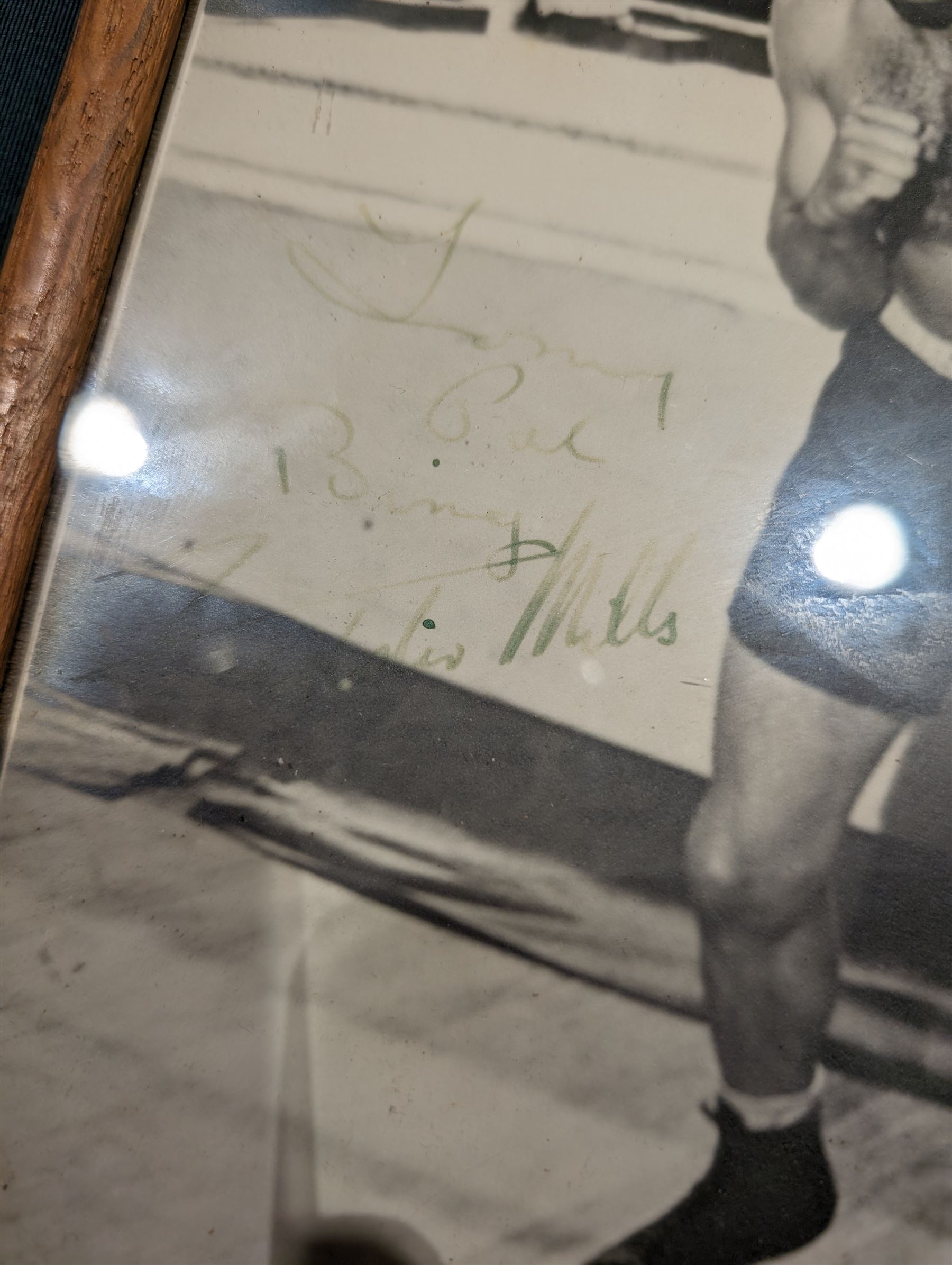 Signed photograph of British boxer Freddie Mills, together with a framed print of boxers Joe Louis and Billy Conn, a signed picture of Giacomo Agostini and a pair of 1930s brown leather boxing gloves