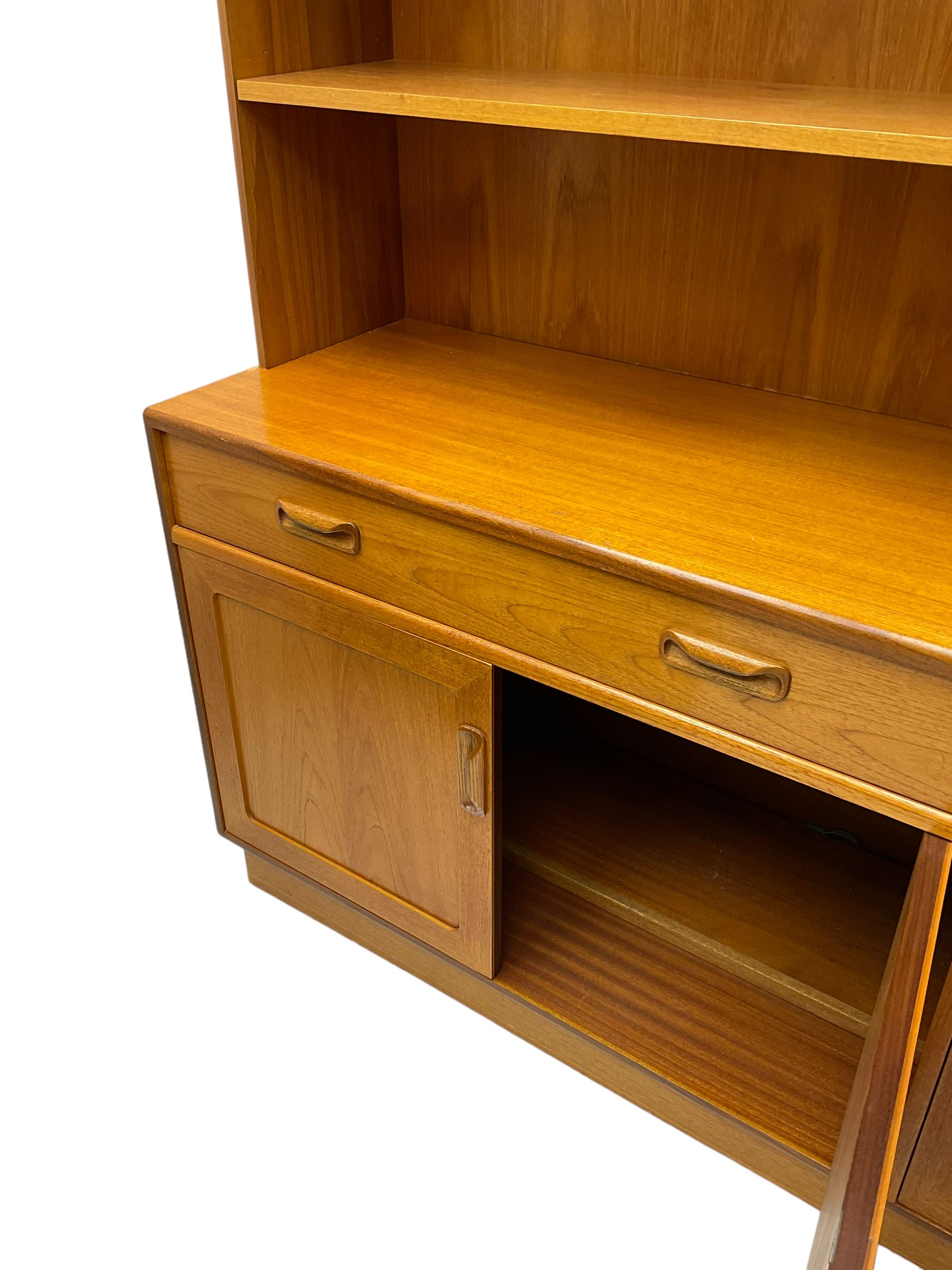 G-Plan - teak wall unit, raised display cabinet with shelves and fall front compartment, fitted with drawer, double cupboard and single cupboard below