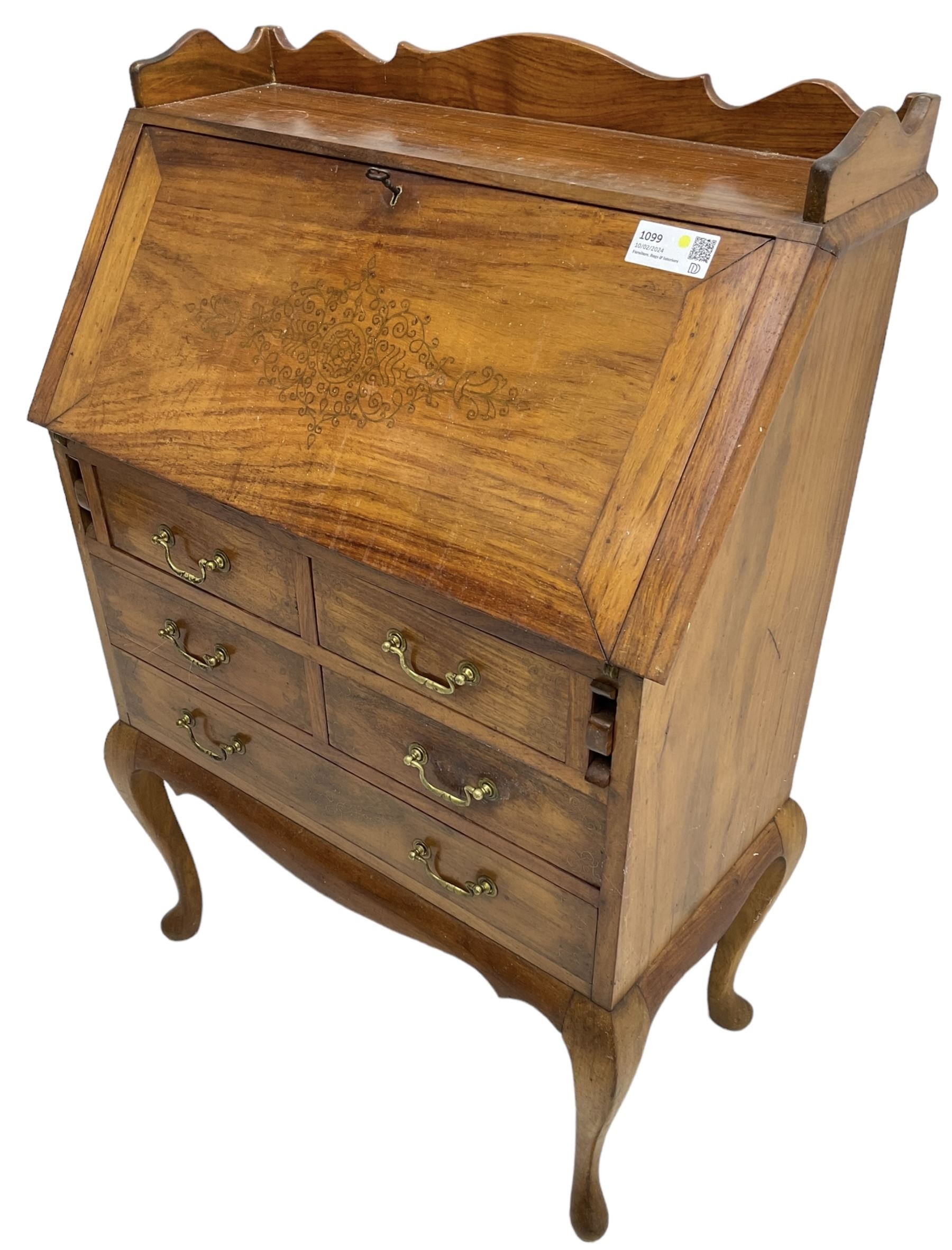 Inlaid hardwood bureau, shaped raised back over fall front inlaid with brass scrollwork, four short over one long drawer, on cabriole supports  