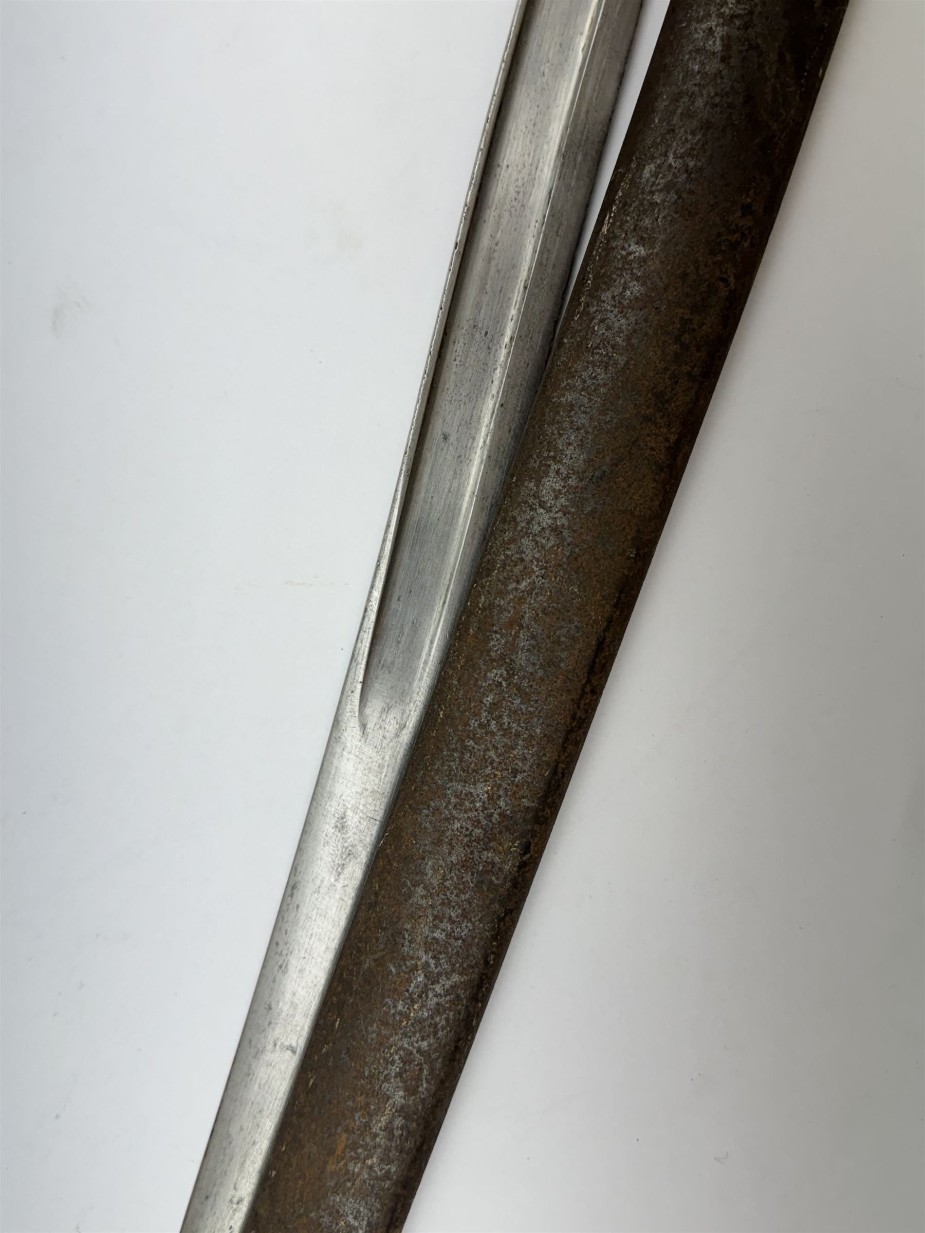 WWI French Chassepot Sword bayonet 57cm steel blade inscribed to the back-edge 'Tulle Juillet 1874', the cross-guard with indistinctly impressed number, in its steel scabbard, L71cm