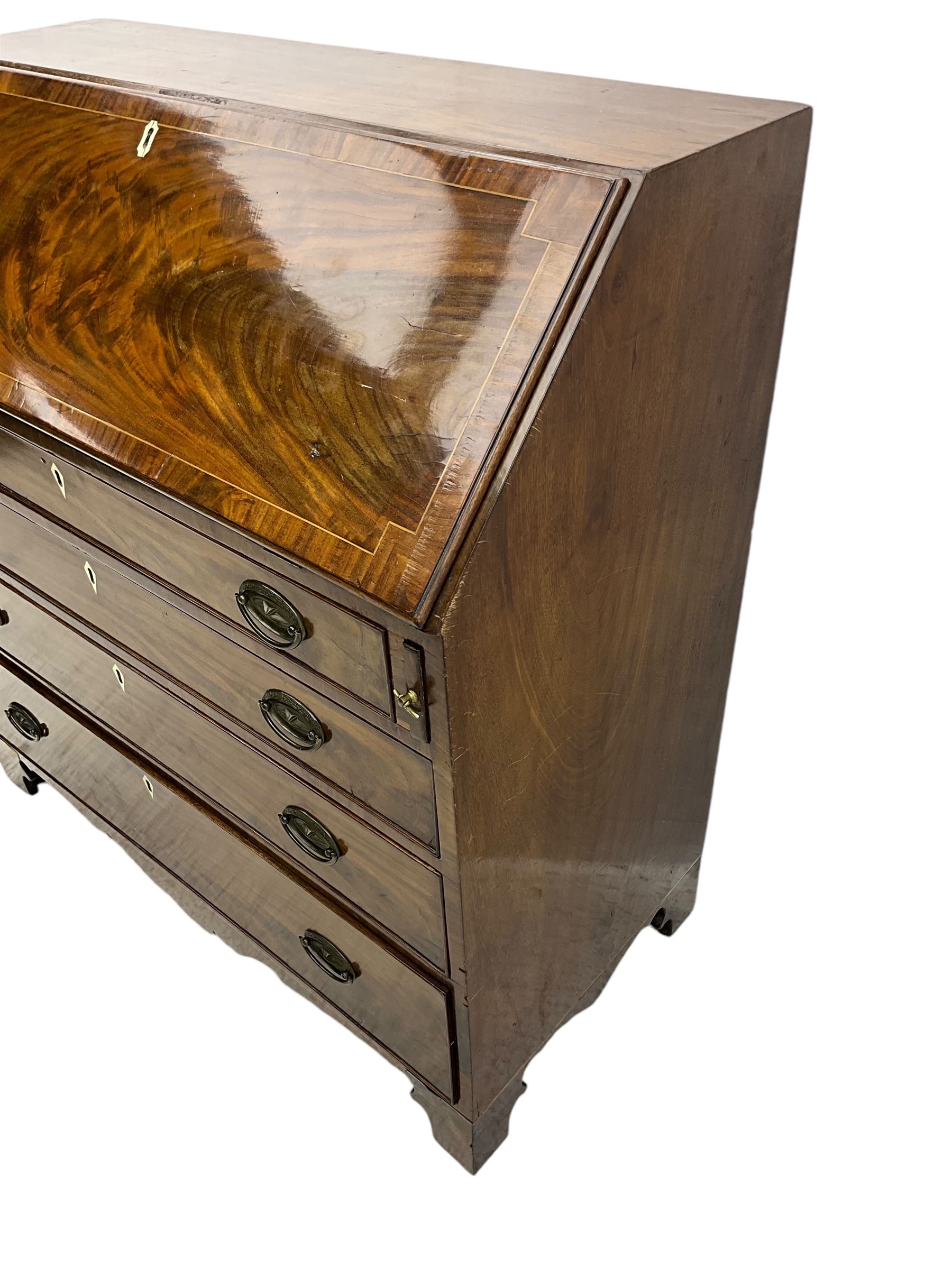 George III mahogany bureau, hinged fall front enclosing satinwood interior fitted with cupboard, drawers and pigeon holes, four long graduating cock-beaded drawers, bone escutcheons, shaped apron on bracket feet 