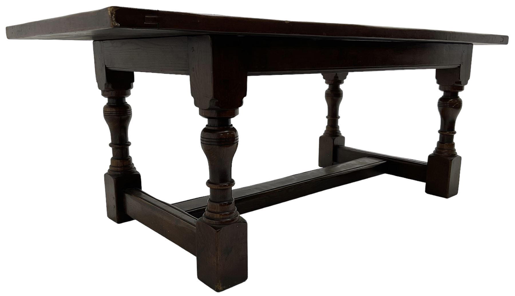 20th century oak refectory dining table, rectangular cleated top on turned supports joined by H-stretcher