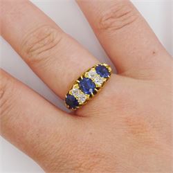 Victorian 18ct gold three stone oval cut sapphire and four stone old cut diamond ring, Chester 1898, total sapphire weight approx 1.70 carat, total diamond weight approx 0.40 carat