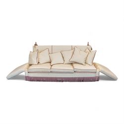 Grande Knole four-seat sofa, upholstered in geometric lozenge pattern cream fabric with burgundy and cream twist piping and fringe, on castors