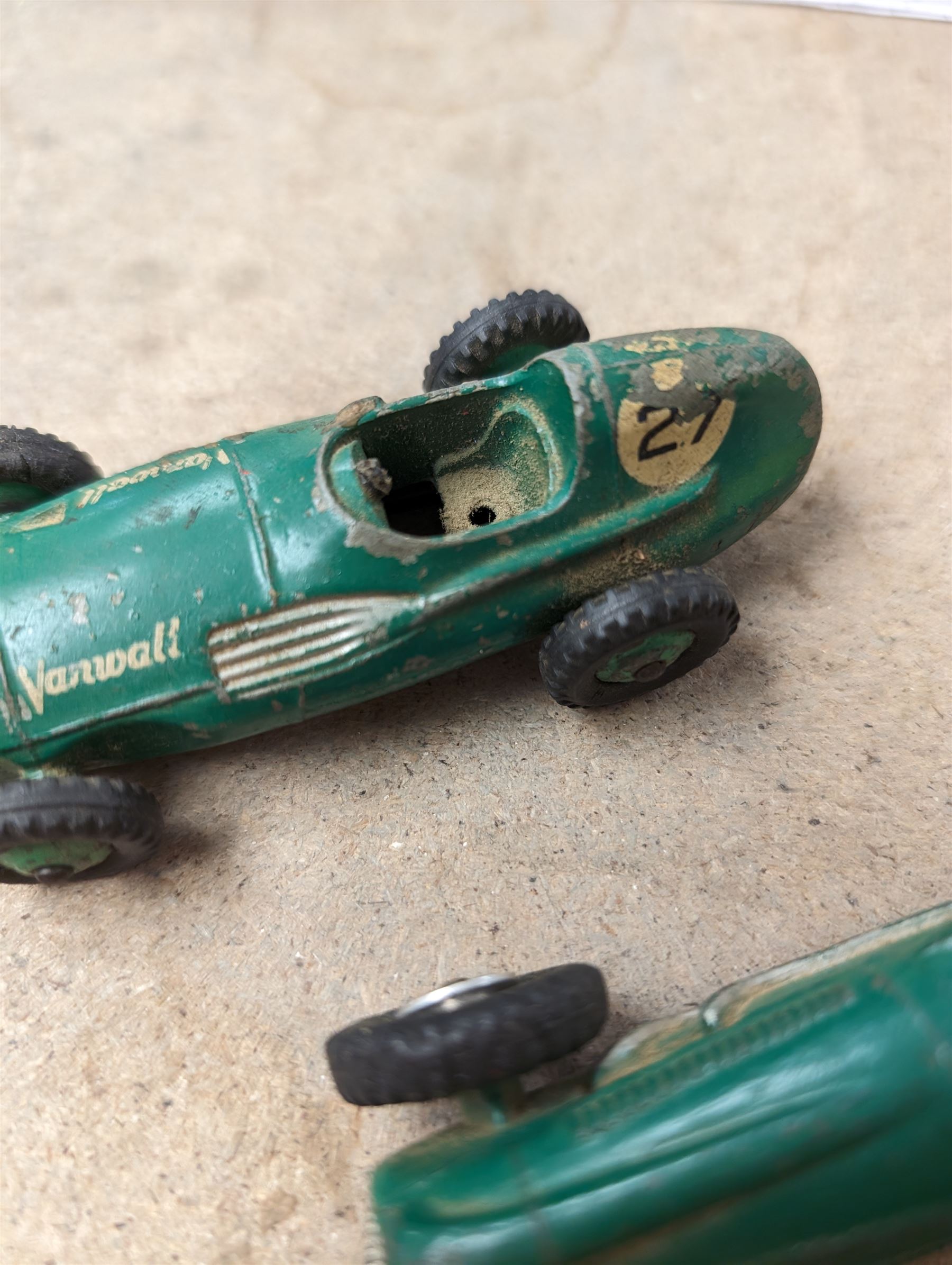 Four Dinky race cars, to include Cooper Bristol, two Alfa Romeos and a Vanwall