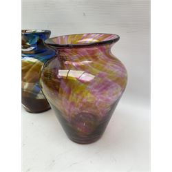 Three Hartley Wood coloured glass vases, each of baluster form with swirling decoration, tallest H21cm