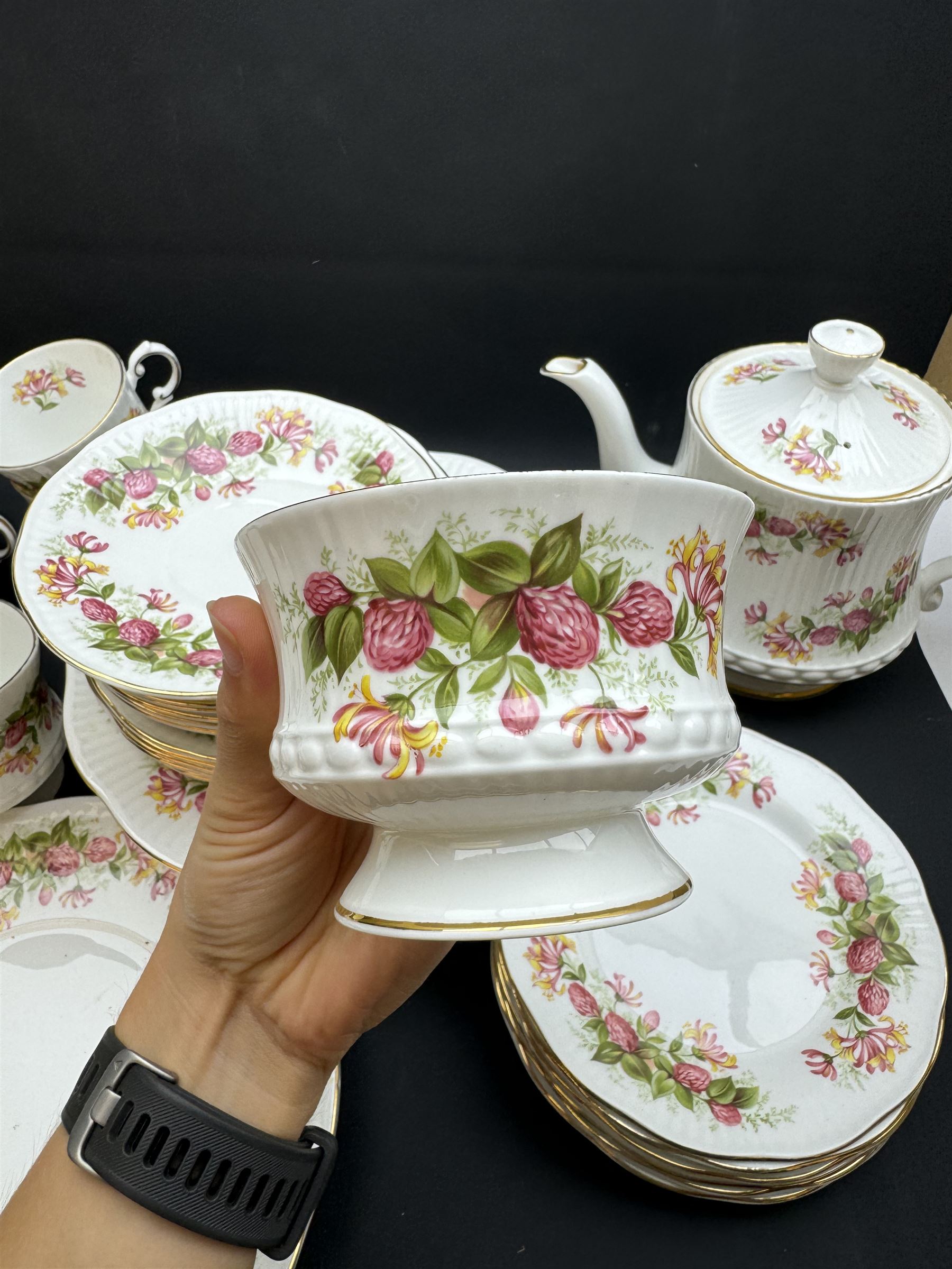 Queens, Woman & Home pattern tea service, including teapot, milk jug, seven teacups etc 