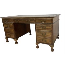 Georgian design twin pedestal desk, rectangular top with green leather inset, fitted with nine drawers, on cabriole supports with ball and claw feet 